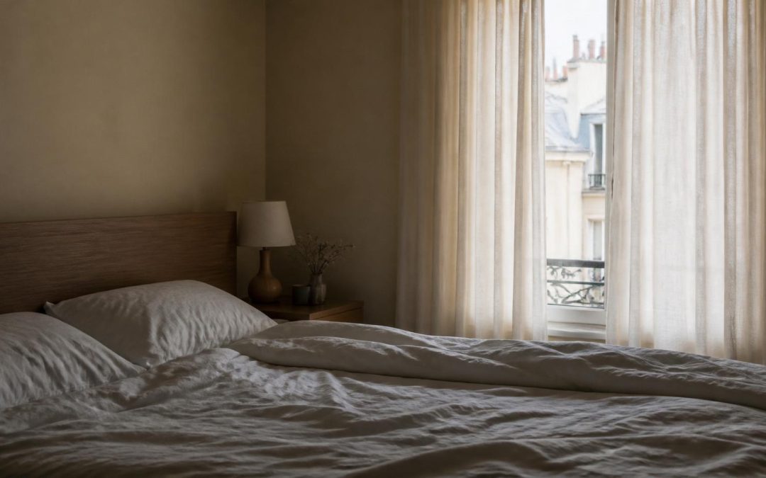 An empty bed in daylight, representing unstructured rest and recovery